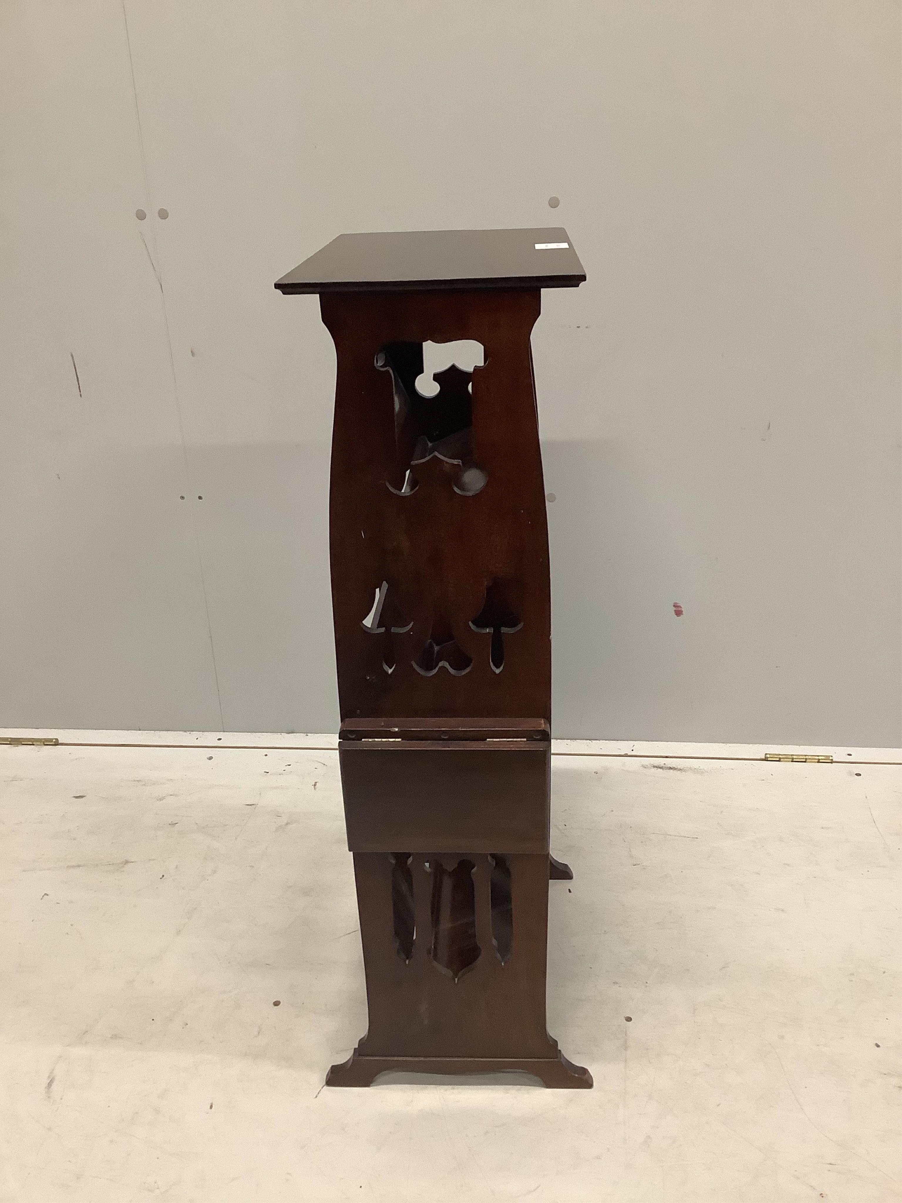 A late 19th century Arts & Crafts mahogany open bookcase, with embossed copper mounted shelf fronts, width 44cm, depth 20cm, height 89cm. Condition - good